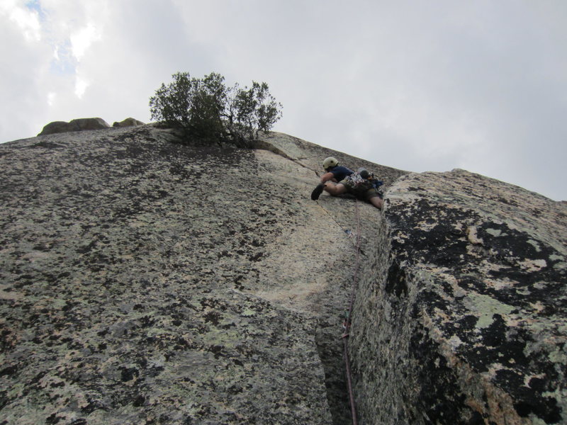 Clay starting off on pitch 3; he finished the pitch in light rain