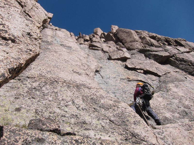 Lisa studying her options near the start of the fourth pitch. She eventually decided to go out right and up rather than straight up, which looked a bit easier with better pro.