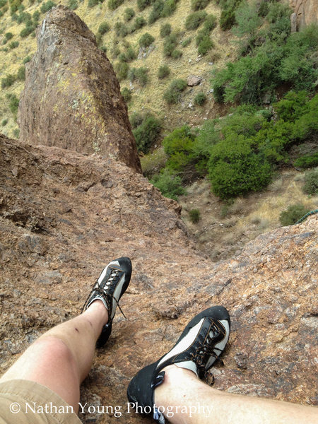 The 2nd pitch belay ledge, with only the last 10 feet of class 4 scrambling visible.  Right below this is a gully and the last piece of pro is about 15' down in a smaller pocket (I was able to get a .5 BD C4 in there).  