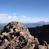 Summit sidewalk with Long's Peak and Lumpy Ridge in the background.