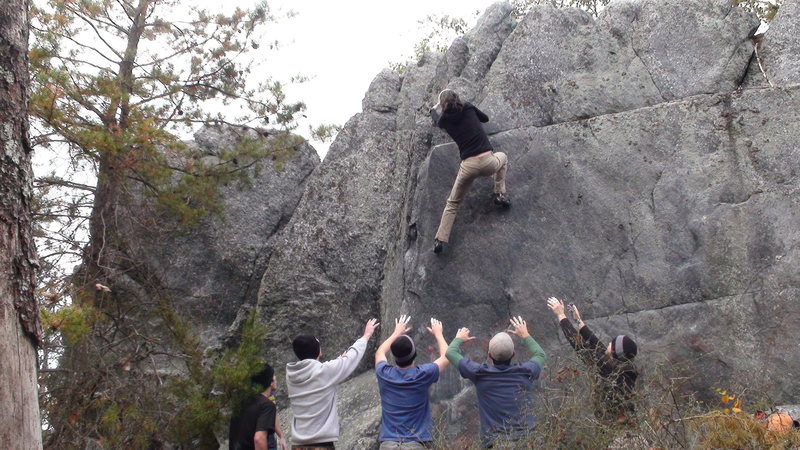 Through the crux on Classic Arete