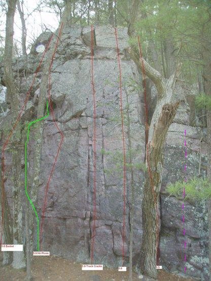 V0-V1 boulder problem marked in purple dashes on the far right.  Ends at nice walk off ledge.  Super fun sequence with beauty landing.