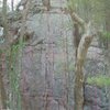 V0-V1 boulder problem marked in purple dashes on the far right.  Ends at nice walk off ledge.  Super fun sequence with beauty landing.