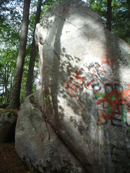 Graffiti Face Project.  This is the first boulder you see on approach.  I worked on trying to get up the thin face with the arete for your left hand...  Nothing to show for it but it might go.   