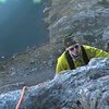 Topping out on the crux pitch.