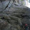 Christopher Lane coming of the ledge at Buttress.