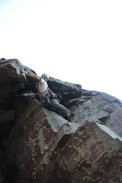 Mike Sohasky working his way over the second o-hang of the "Double Overhang" route.