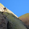 Climber atop pitch 1