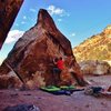 The start to Spiffy Black Boots problem on Divide Rock.