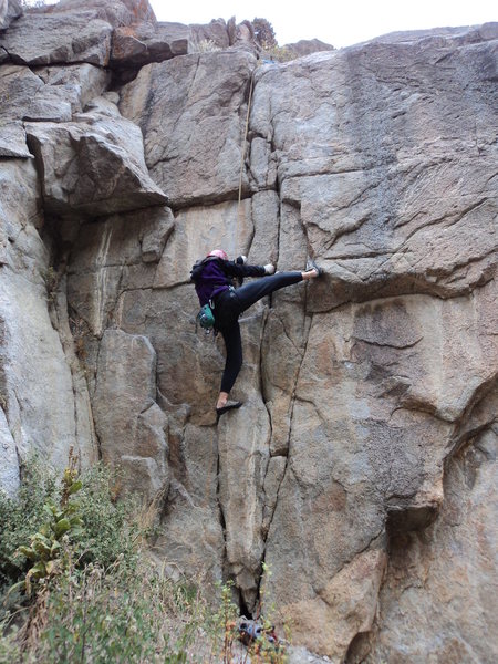 Deb trying to figure out the crux footwork.