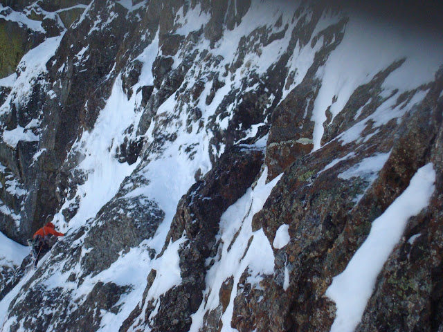 Colin Haley leading a steep ice pitch on Ski Tracks