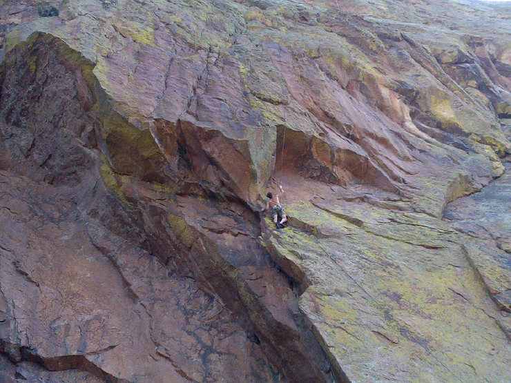 Approaching the roof on pitch 2.  Have some small gear ready for this section.  The last bolt is up in the roof.  Le Void to the left, Love Minus Zero to the right.