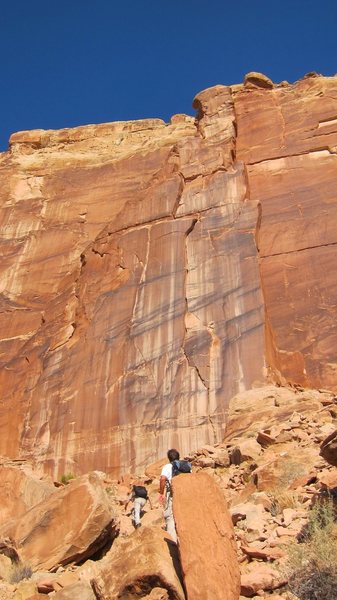 Approaching the tower - P1 is the thin crack left of the dihedral in the center.