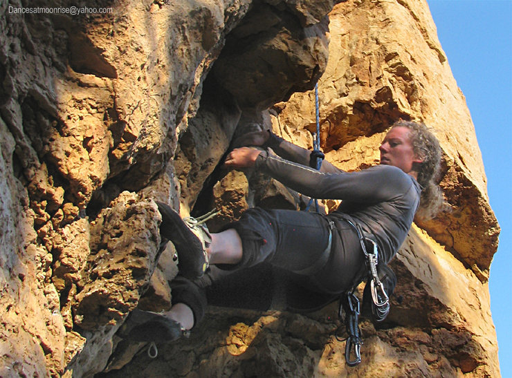 Emma pulls the overhang to enter the chimney.