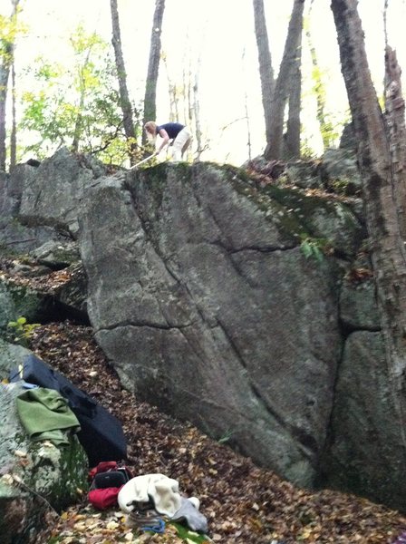 Emily cleaning the Creekside Boulder