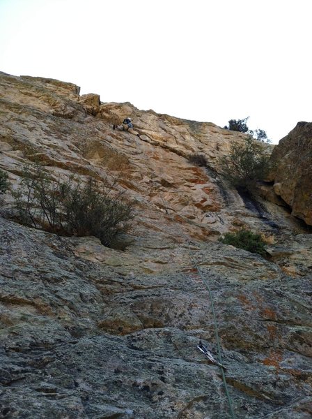 Scott leading pitch two of "Printer Boy".  Notice that he is stepping on the death block.  Even from the belay, I could see that it is a ticking time bomb that seems to hang directly over the belay.  I was cringing at the thought of it cutting loose!