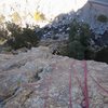 Kat A. working her way through the 'Gates Of Eden' (5.10) at Bell Buttress in Sept. 2012.  