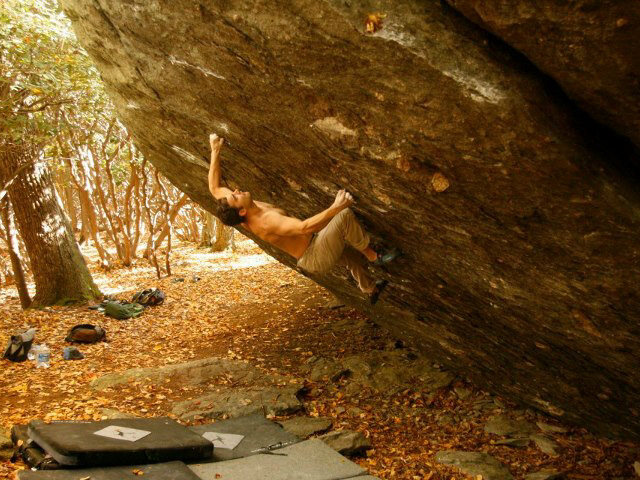 Greg Loomis making the FA of Hades on the Olympus Boulder