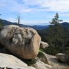 The Orange Flambe boulder; the main trail is to the left of this photo, and it's only about 100' from the B1 traverse.  Orange Flambe climbs the overhanging arete on the right.