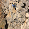 Ben Hanna on the lower slab<br>
Survival of the Fittest (5.13a)