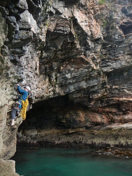 traversing the cave at low tide towards the start