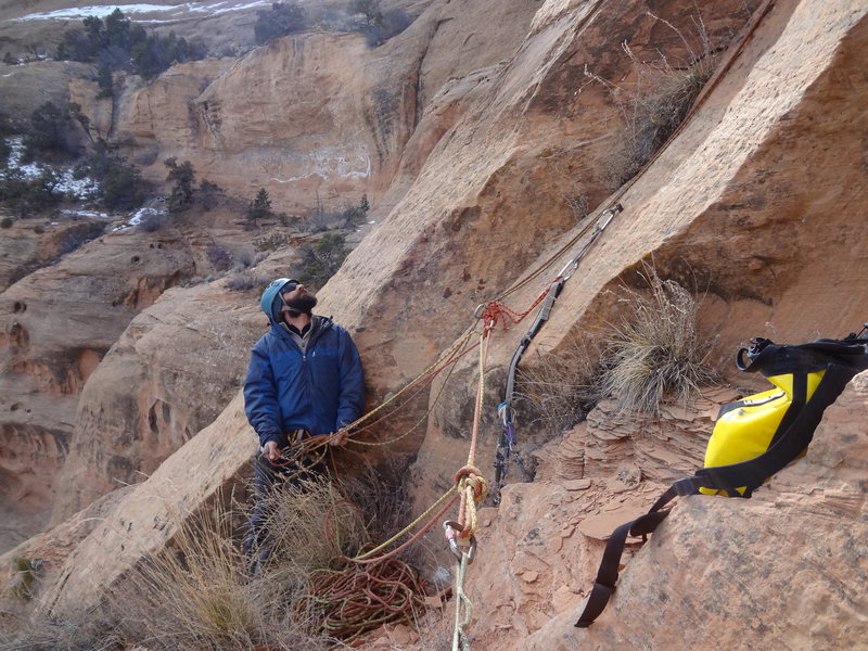 Hanging at the ring angle belay, with the R rated slab just behind.