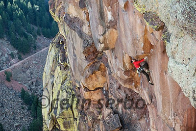 Chris Weidner on the crux roof. Photo: Celin Serbo.