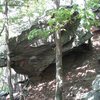 When you see this boulder from the trail you know Skink Rock is near. It is hidden behind the boulder and downhill 30 feet.