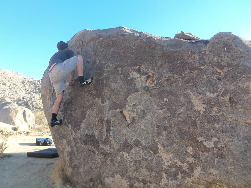 Awkward high step mantle on crimps