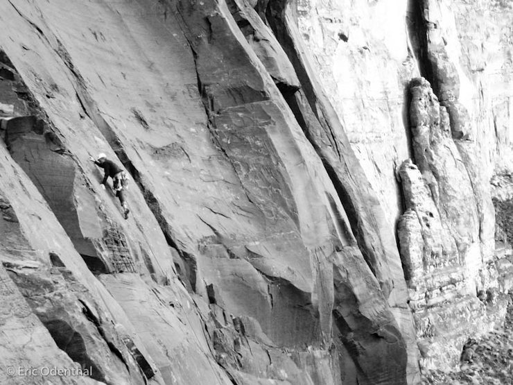 climber dude just reaching the crux on Night Light 5.10a.  