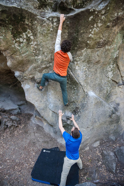 Long reach on the Waimea Wall.