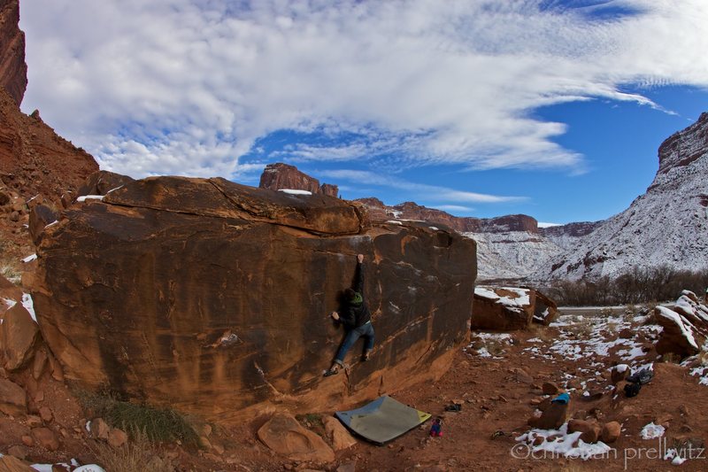 Christian Prellwitz climbing 'Slots Of Fun' (v2) at Big Bend in Moab, Utah.