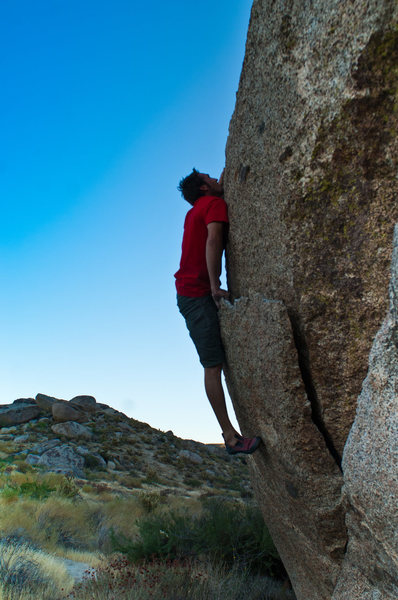 Nick Ciotti mantels up his new route (v3+) "Illustrator" on the Vector Boulder. Start on Vector crack then mantel up the middle of the large flake to a knob and top out.