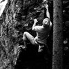 Aaron Parlier with the FA of the "Crucible" on the Big Rig Boulder, Wildwood, GHSP