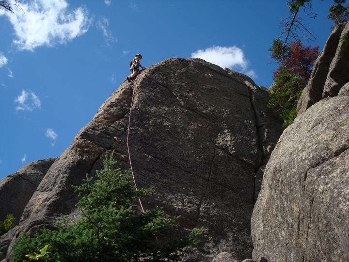 Tom finishes the climb.