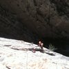 Dylan belaying at the start of the last 11b pitch