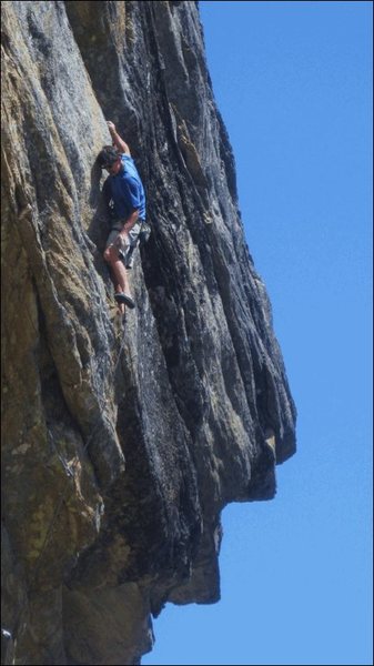 Climber on QED-MF, Big Science & Scary Math to the right of the climber 