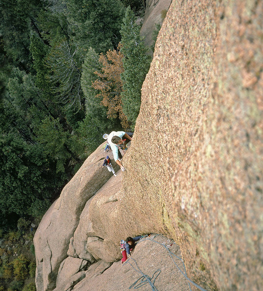 Warpath, pitch 2. First ascent, October 1988. Strappo leading. Noel Childs in blue hat down below, pretending to belay. Fran Bagenal on Trout-Baker Buttress pitch 2.