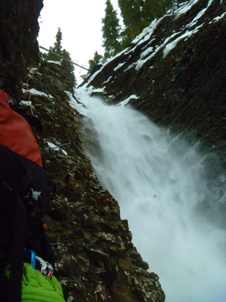 There was a lot of snow accumulation at the top and climbing right to the belay tree was impossible to protect. Had to climb further to the right and then downclimb to the rap tree.