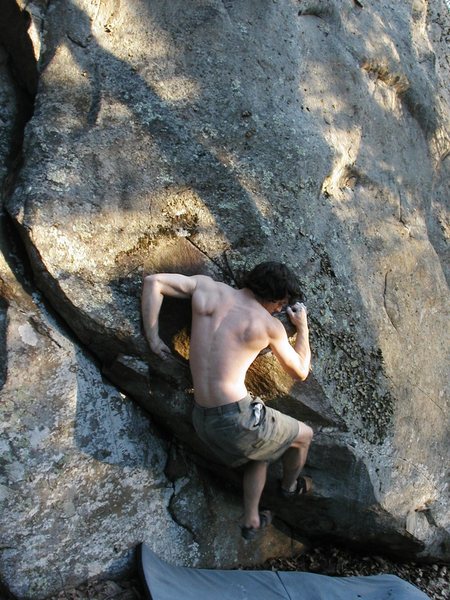 A cool easy problem on the back of the project boulder that is now obscured by a fallen tree.