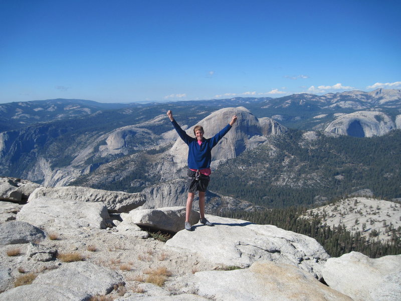 me at the top of starr king with half dome and watkins in the background!