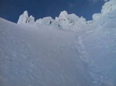 Above the first step, it's best to cross the hogsback ridge above the rock feature to the left.
