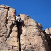 George ascends the crack.  He is just below the crux.