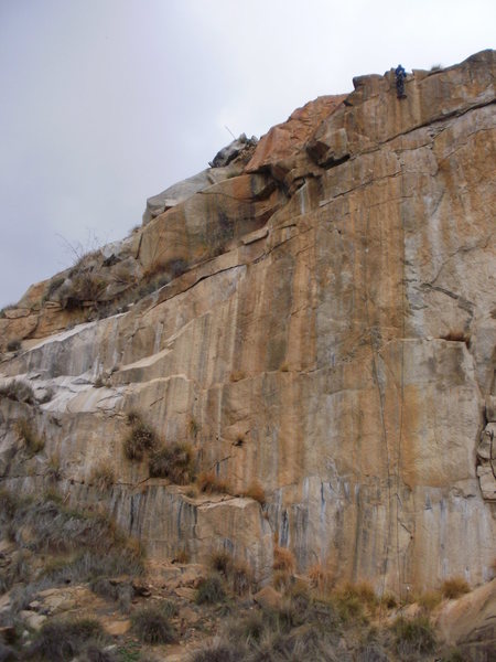 Blocky terrain to the left of the route.