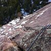 A snowy day on the First Flatiron. Off route on Baker's Way (5.3)