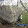 Setting feet up for the big move to the mono hole up top. Check out the amazing incut horizontal my right hand is on.   Best problem in Connecticut.