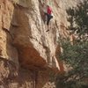 Cruising up the easy finger crack at the start.