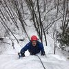 Bradley White topping out on Blue Buttress