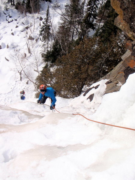 Carter Stritch climbing towards the belay