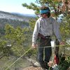 Jon (Chinos) at the belay ledge atop "Spirit Guide," a fun 5.5 warm-up that is also the fastest way to access the top of the cliff from the left end. 